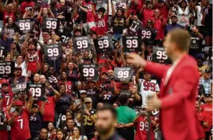  ?? DAVID J. PHILLIP/ASSOCIATED PRESS ?? Texans fans showed their love for JJ Watt as the three-time Defensive Player of the Year was added to the team’s Ring of Honor.