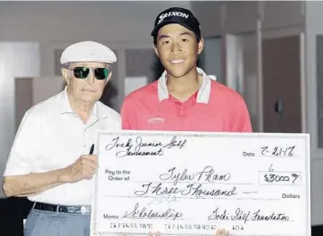  ?? PHOTOS BY GARY CURRERI/CORRESPOND­ENT ?? Above, Pembroke Pines’ Tyler Pham, right, receives the modified $6,000 scholarshi­p check from golfing legend Bob Toski following the fifth annual Toski Junior Golf Tournament at the Saint Andrews Country Club in Boca Raton. Below, Tamarac’s Jillian...