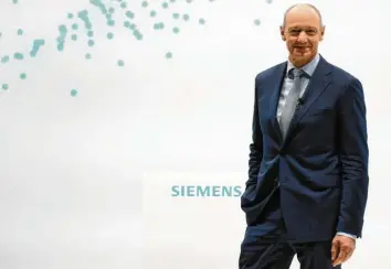  ?? Foto: Matthias Schrader, dpa ?? Mit Roland Busch steht seit langer Zeit wieder ein Techniker an der Spitze des Siemens‰Konzerns.