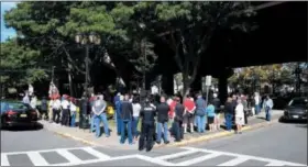  ?? PHOTO PROVIDED ?? A large crowd gathers during a special ceremony at the Green Island Vietnam Veterans Memorial Monument on Sunday.