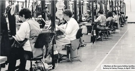  ??  ?? > Workers at the Laura Ashley textiles factory in Carno, Powys, in April 1992