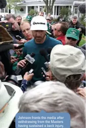  ??  ?? Johnson fronts the media after withdrawin­g from the Masters having sustained a back injury.