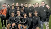  ?? KEVIN STENT/FAIRFAX NZ ?? The Wellington College first XI hockey team with their Premier 1 trophy on Friday.