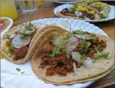  ?? Gretchen McKay/Post-Gazette ?? Chorizo tacos at Round Corner Cantina in Lawrencevi­lle.