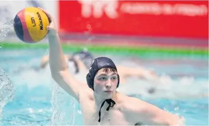  ??  ?? ●●Water polo star Michael Patterson in action