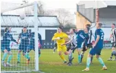  ?? Photo / Getty Images ?? Connor Hall scores Chorley’s opener in their 2-0 win over Derby.