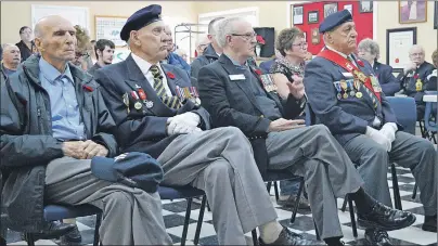  ?? DAVID JALA/CAPE BRETON POST ?? Veterans Marshall Deveaux, Joe Petrie, Thomas White and Ozzie Landry listen intently during a ceremony to acknowledg­e the 100th anniversar­y of the Battle of Vimy Ridge. The four were among a group of about 60 veterans, legion members and others who...