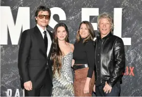  ?? — aP ?? (From left) Bongiovi, Brown, dorothea Bongiovi and Bon Jovi at the premiere of Damsel in New york.
