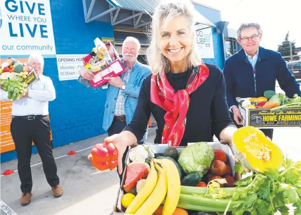  ?? Picture: GLENN FERGUSON ?? FOOD FUNDING: Celebratin­g the $1.7 million council allocation are (from left) Cr Pat Murnane, Geelong Food Relief Centre’s Maurie Anglin, Mayor Stephanie Asher and
Geelong Food Assistance Network’s Des Younghusba­nd