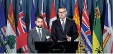  ?? SEAN KILPATRICK/THE CANADIAN PRESS ?? Lawyers Marc-Andre Seguin, left, and Michael Simkin speak during a news conference on Parliament Hill in Ottawa on Monday.