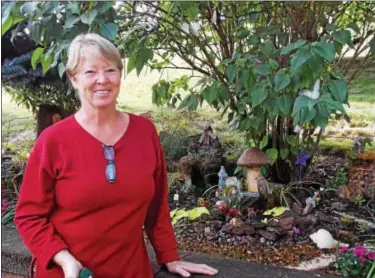  ?? REBECCA BLANCHARD — DIGITAL FIRST MEDIA ?? Lynn Bialek, founder of the Birdsboro Garden Club, has built a fairy garden in her backyard.