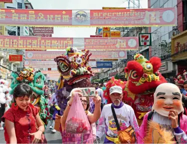  ??  ?? On February 5, 2019, the first day of the Chinese lunar New Year, Thailand’s China Town located on Yaowarat Road in Bangkok is crowded with locals and tourists.