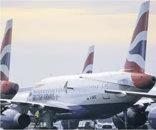  ??  ?? Poor show British Airways, which stores planes at Glasgow Airport , has thrown its staff on the scrapheap, according to Mr Newlands