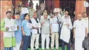  ??  ?? CPM members and AAP MP Dr Dharamvira Gandhi (second from right) staging a protest outside Parliament. Earlier, the Rajya Sabha witnessed uproar over naming of Chandigarh airport. PTI