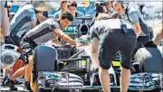  ?? AFP PHOTO ?? Mercedes’ Lewis Hamilton arrives for a pit stop during the first practice session in Hockenheim on Friday.