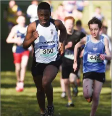  ??  ?? Esosa Victor of St Joseph’s CBS Drogheda, left, and Jack O’Donnell of Dunshaughl­in CC competing in the Junior Boys 3,000m event during the Irish Life Health Leinster Schools Cross Country at Santry Demesne.