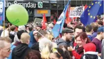  ??  ?? A counter demonstrat­ion marches in Berlin Saturday.