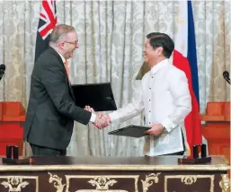  ?? ?? Prime Minister Anthony Albanese and President Ferdinand R. Marcos, Jr. sign a Joint Declaratio­n on Strategic Partnershi­p at the Malacañan Palace last September. The elevation of the bilateral relation between Australia and the Philippine­s formalizes what is an already broad range of cooperatio­n based on similar values and shared vision for the region.