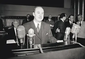  ?? Preston Stroup / Associated Press 1955 ?? Dr. Thomas Francis prepares to give a report in Michigan on Salk polio vaccine tests in 1955. Francis was the first to publish a paper on and name the Doctrine of Original Antigenic Sin.