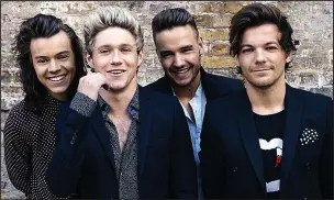  ??  ?? Scaling the heights: Liam Payne and his One Direction bandmates