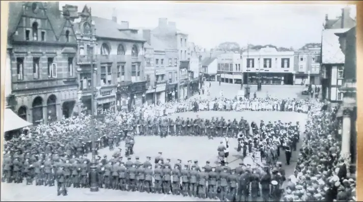  ??  ?? ■ What looks like a remembranc­e gathering in Loughborou­gh Market Place, possibly 1920s or 1930s. Loughborou­gh Echo Looking Back archive photos