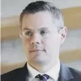  ??  ?? 0 Derek Mackay said the SNP has control of public finances