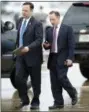  ?? ALEX BRANDON — ASSOCIATED PRESS ?? Former White House Chief of Staff Reince Priebus, right, walks with White House Director of Social Media Dan Scavino after stepping off Air Force One at Andrews Air Force Base in Maryland on Friday.