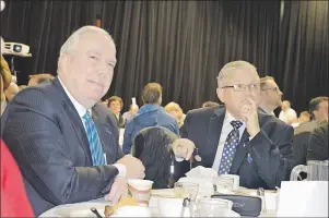  ?? GREG MCNEIL/CAPE BRETON POST ?? Ken Haley and David Muise told their personal stories of battling cancer and care during Wednesday’s Wake Up Call breakfast at Centre 200 in Sydney. The event raised $37,600.