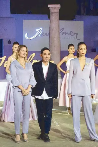  ??  ?? Gaelle Branellec and Joey Samson (first and second from left) take a bow after the models’ final walk