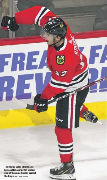  ?? MATT MARTON/AP ?? The Hawks’ Dylan Strome celebrates after scoring his second goal of the game Sunday against the Kings.