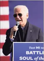  ?? Andrew Harnik / Associated Press ?? Joe Biden speaks at a rally in Flint, Mich., Saturday.