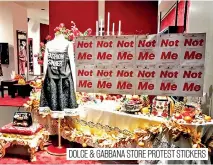  ??  ?? DOLCE &amp; GABBANA STORE PROTEST STICKERS