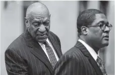  ?? THE ASSOCIATED PRESS ?? Bill Cosby, left, arrives for a pretrial hearing in his sexual assault case Friday at the Montgomery County Courthouse in Norristown, Pa.