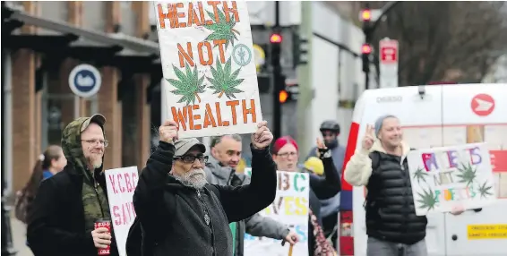  ??  ?? Members of the Cannabis Buyers Club stage a protest Wednesday at Victoria-Beacon Hill MLA Carole James’s office on Fort Street.