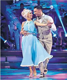  ??  ?? Top performanc­e: Debbie and Giovanni scored high with their Viennese Waltz