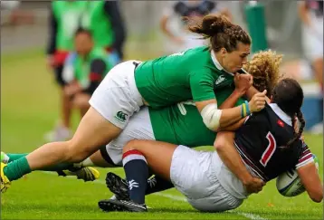  ??  ?? Katie Fitzhenry in rugby sevens action for Ireland against Hong Kong.