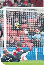  ??  ?? Burnley’s Matej Vydra nets the winner