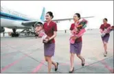  ?? XINHUA ?? Cabin crew of China Southern Airlines prepare to board a flight in Lanzhou, capital of Gansu province.