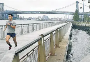  ??  ?? $INKING RETURNS: East River Park in lower Manhattan is a great venue for runners, but recently installed amenities will be bulldozed and buried under a $1.45 billion plan to protect the area from flooding. A mayoral rep insists the amenities will be replaced.