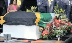  ??  ?? Pictured at Kay Moonsamy’s funeral were, from left: former eThekweni mayor James Nxumalo; Deputy Minister of Public Works, Jeremy Cronin; KZN Premier Willies Mchunu; and ANC presidenti­al hopeful, Nkosazana Dlamini Zuma. RIGHT: The coffin draped with...