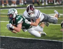  ?? MARK KEMPTON — FOR THE MORNING JOURNAL ?? Elyria Catholic hosted Rocky River in a GLC matchup Sept. 17at Dan Reaser Stadium.