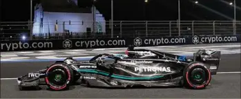  ?? Luca Bruno / Associated Press ?? Mercedes driver George Russell drives during the second free practice Friday ahead of Sunday’s Formula One Grand Prix in Jeddah, Saudi Arabia.