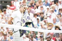  ?? — AFP photo ?? Roger Federer on his way to taking the first set against France's Adrian Mannarino in just 16 minutes.