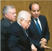  ?? AMR NABI/AP ?? Egyptian President Abdel-Fattah el-Sissi, right, greets Palestinia­n President Mahmoud Abbas, center, and King Abdullah II of Jordan on Sunday in Cairo, Egypt.