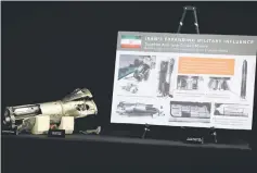  ??  ?? Remains of Iranian Toophan anti-tank guided missile provided by Pentagon are on display. — Reuters photo