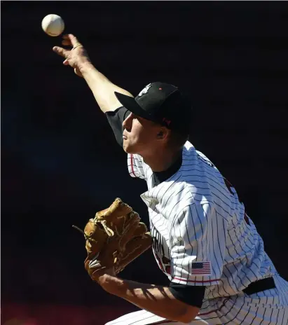  ?? Herald staFF FIle ?? NEXT LEVEL: Northeaste­rn’s Sam Jacobsak pitches against Boston College during the 30th annual Baseball Beanpot consolatio­n game at Fenway Park in 2019.