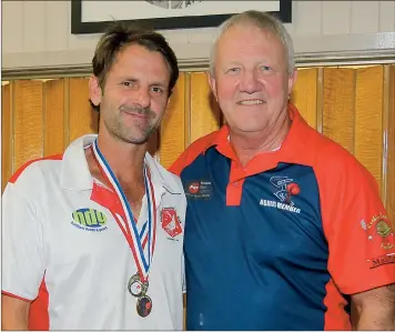  ??  ?? HONOURED: Dual Cec Hopper Medallist Simon Hopper with Horsham Cricket Associatio­n board member and new life member Tony Wills. Picture: WILLAMY IMAGES