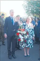  ??  ?? Tararua District Council’s CEO Blair King and Mayor Tracey Collis present a wreath.