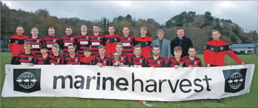  ?? Photograph: Stephen Lawson. ?? Lochside Rovers with the Marine Harvest South Division One League championsh­ip trophy presented by councillor Roddy McCuish and Camanachd Associatio­n president Jim Barr.