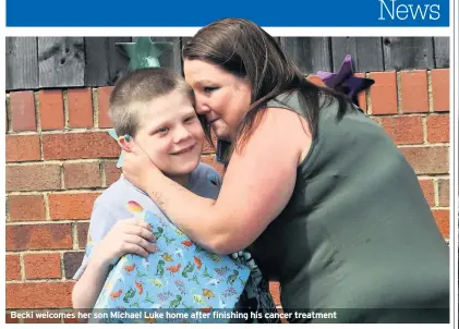  ??  ?? Becki welcomes her son Michael Luke home after finishing his cancer treatment